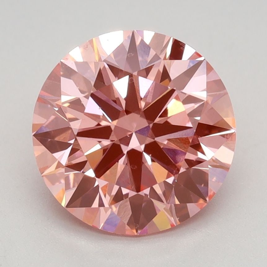 Ideal Loose Diamond - ROUND 2.16ct Fancy Vivid Pink VS1: Ideal Loose Diamond - ROUND 2.16ct Fancy Vivid Pink VS1 Source: This is a real non-mined Diamond that has been grown in a lab Shape: ROUND Carats: 2.16 Color: Fancy Vivid Pink Certification: IGI Video