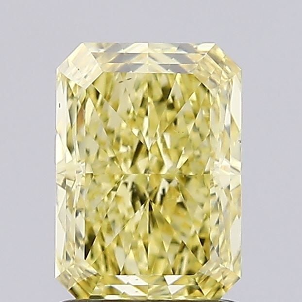 Loose Diamond - RADIANT 1.39ct Fancy Vivid Yellow VS1: Loose Diamond - RADIANT 1.39ct Fancy Vivid Yellow VS1 Source: This is a real non-mined Diamond that has been grown in a lab Shape: RADIANT Carats: 1.39 Color: Fancy Vivid Yellow Certification: IGI Vid