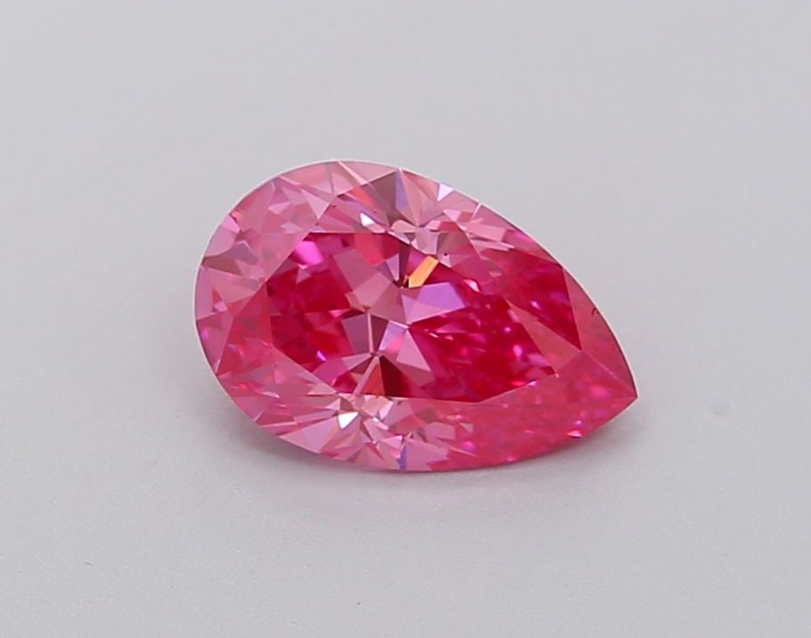 Loose Diamond - PEAR 1.12ct Fancy Vivid Pink VVS2: Loose Diamond - PEAR 1.12ct Fancy Vivid Pink VVS2 Source: This is a real non-mined Diamond that has been grown in a lab Shape: PEAR Carats: 1.12 Color: Fancy Vivid Pink Certification: IGI Video: