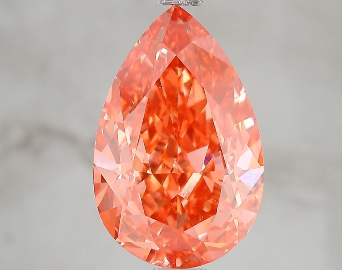 Loose Diamond - PEAR 4.96ct Fancy Vivid Pink VS2: Loose Diamond - PEAR 4.96ct Fancy Vivid Pink VS2 Source: This is a real non-mined Diamond that has been grown in a lab Shape: PEAR Carats: 4.96 Color: Fancy Vivid Pink Certification: IGI Video: