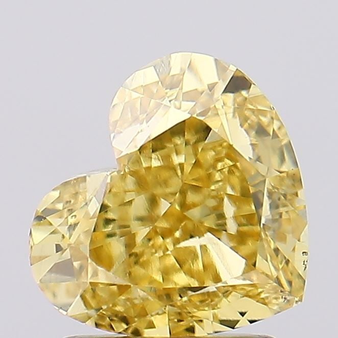 Loose Diamond - HEART 2.0ct Fancy Vivid Yellow VS2: Loose Diamond - HEART 2.0ct Fancy Vivid Yellow VS2 Source: This is a real non-mined Diamond that has been grown in a lab Shape: HEART Carats: 2.0 Color: Fancy Vivid Yellow Certification: IGI Video: