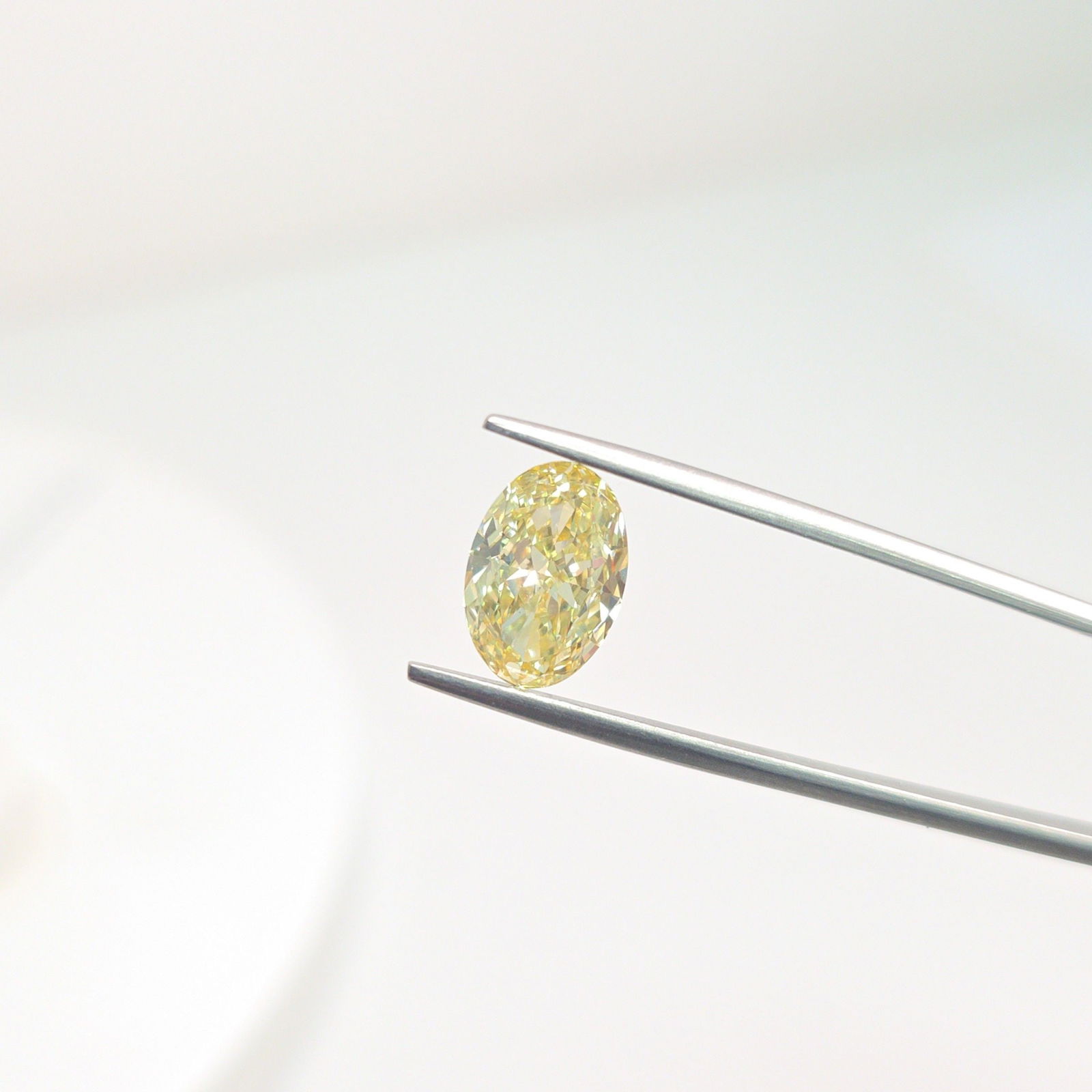 Loose Diamond - OVAL 3.06ct Fancy Intense Yellow VVS2: Loose Diamond - OVAL 3.06ct Fancy Intense Yellow VVS2 Source: This is a real non-mined Diamond that has been grown in a lab Shape: OVAL Carats: 3.06 Color: Fancy Intense Yellow Certification: IGI Vide