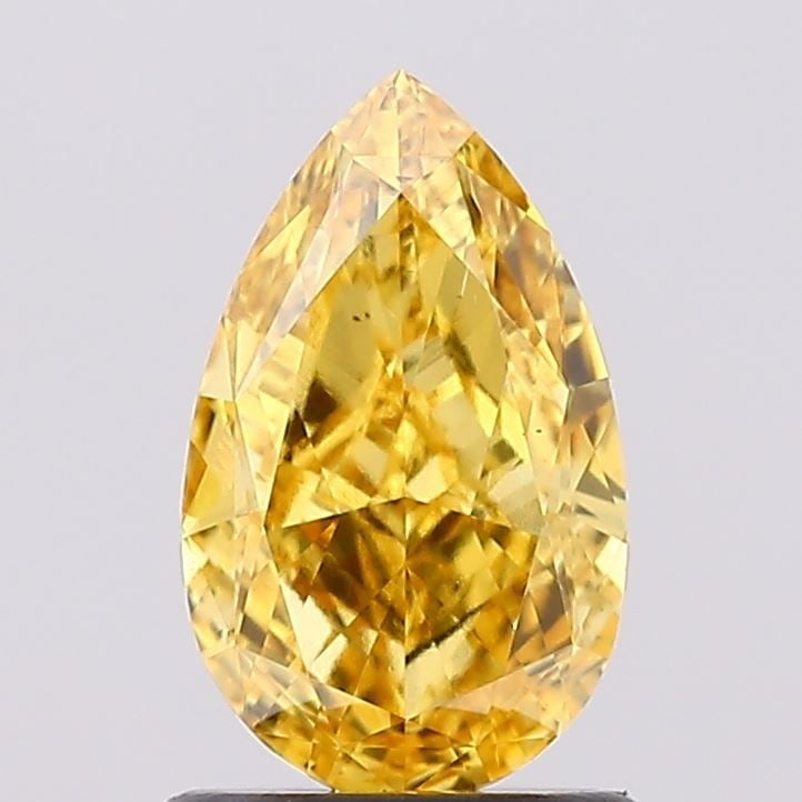 Loose Diamond - PEAR 1.19ct Fancy Vivid Yellow VS2: Loose Diamond - PEAR 1.19ct Fancy Vivid Yellow VS2 Source: This is a real non-mined Diamond that has been grown in a lab Shape: PEAR Carats: 1.19 Color: Fancy Vivid Yellow Certification: IGI Video:
