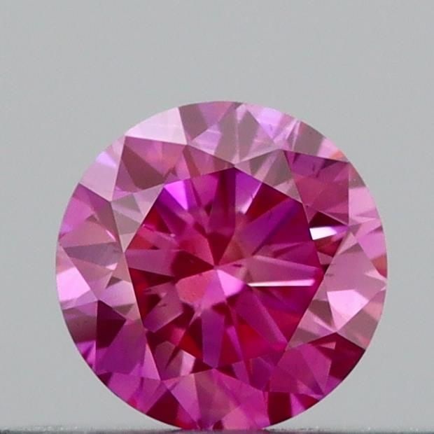 Loose Diamond - ROUND 0.21ct Fancy Vivid Pink VS2: Loose Diamond - ROUND 0.21ct Fancy Vivid Pink VS2 Source: This is a real non-mined Diamond that has been grown in a lab Shape: ROUND Carats: 0.21 Color: Fancy Vivid Pink Certification: IGI Video: