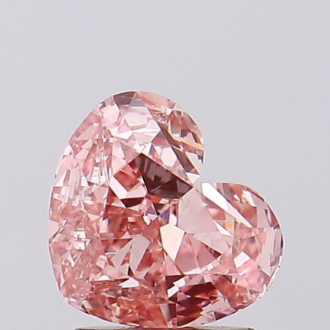 Loose Diamond - HEART 1.85ct Fancy Intense Pink VS1: Loose Diamond - HEART 1.85ct Fancy Intense Pink VS1 Source: This is a real non-mined Diamond that has been grown in a lab Shape: HEART Carats: 1.85 Color: Fancy Intense Pink Certification: IGI Video: