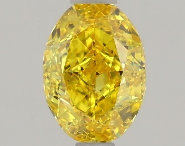 Loose Diamond - OVAL 1.07ct Fancy Vivid Yellow VVS2: Loose Diamond - OVAL 1.07ct Fancy Vivid Yellow VVS2 Source: This is a real non-mined Diamond that has been grown in a lab Shape: OVAL Carats: 1.07 Color: Fancy Vivid Yellow Certification: IGI Video: