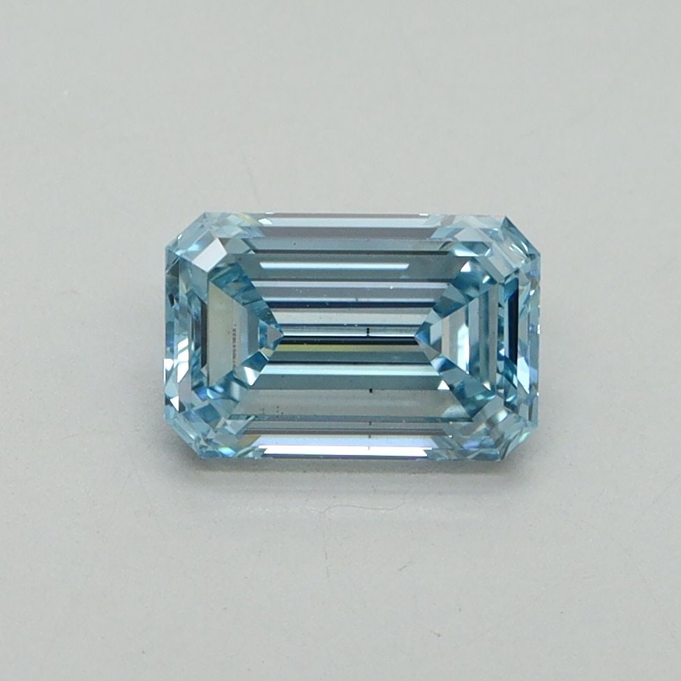 Loose Diamond - EMERALD 1.05ct Fancy Vivid Blue VS2: Loose Diamond - EMERALD 1.05ct Fancy Vivid Blue VS2 Source: This is a real non-mined Diamond that has been grown in a lab Shape: EMERALD Carats: 1.05 Color: Fancy Vivid Blue Certification: IGI