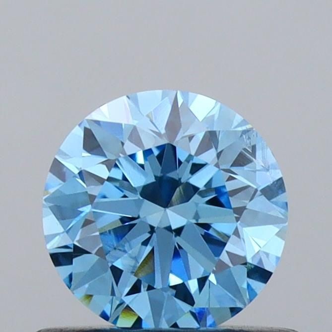 Ideal Loose Diamond - ROUND 0.57ct Fancy Vivid Blue SI2: Ideal Loose Diamond - ROUND 0.57ct Fancy Vivid Blue SI2 Source: This is a real non-mined Diamond that has been grown in a lab Shape: ROUND Carats: 0.57 Color: Fancy Vivid Blue Certification: IGI Video