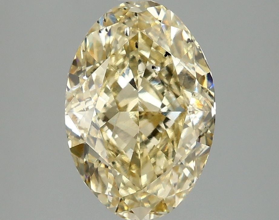 Loose Diamond - OVAL 3.1ct Fancy Intense Yellow SI1: Loose Diamond - OVAL 3.1ct Fancy Intense Yellow SI1 Source: This is a real non-mined Diamond that has been grown in a lab Shape: OVAL Carats: 3.1 Color: Fancy Intense Yellow Certification: IGI Video: