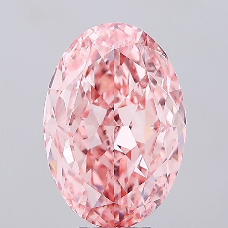 Loose Diamond - OVAL 8.02ct Fancy Vivid Pink VS2: Loose Diamond - OVAL 8.02ct Fancy Vivid Pink VS2 Source: This is a real non-mined Diamond that has been grown in a lab Shape: OVAL Carats: 8.02 Color: Fancy Vivid Pink Certification: IGI Video:
