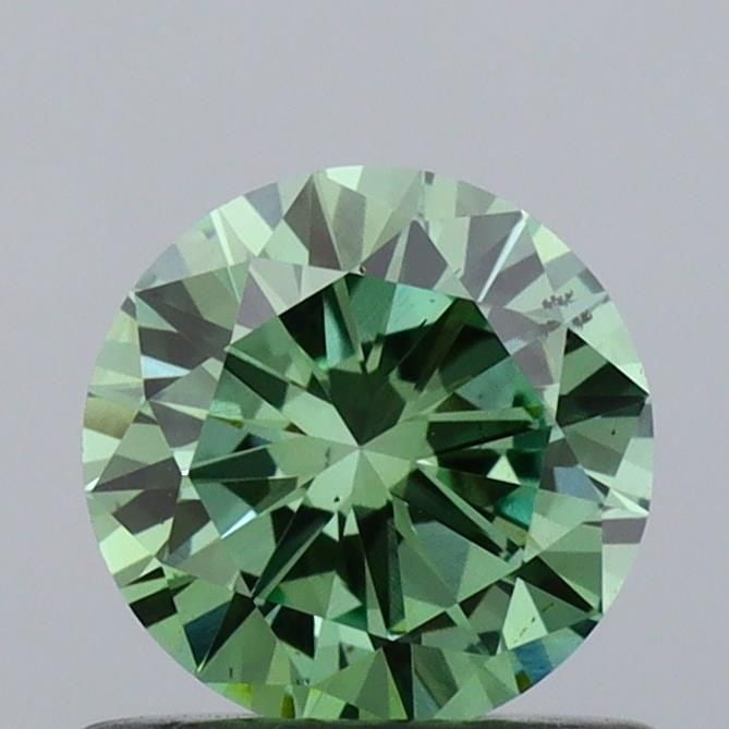Loose Diamond - ROUND 0.61ct Fancy Vivid Green VS2: Loose Diamond - ROUND 0.61ct Fancy Vivid Green VS2 Source: This is a real non-mined Diamond that has been grown in a lab Shape: ROUND Carats: 0.61 Color: Fancy Vivid Green Certification: IGI Video:
