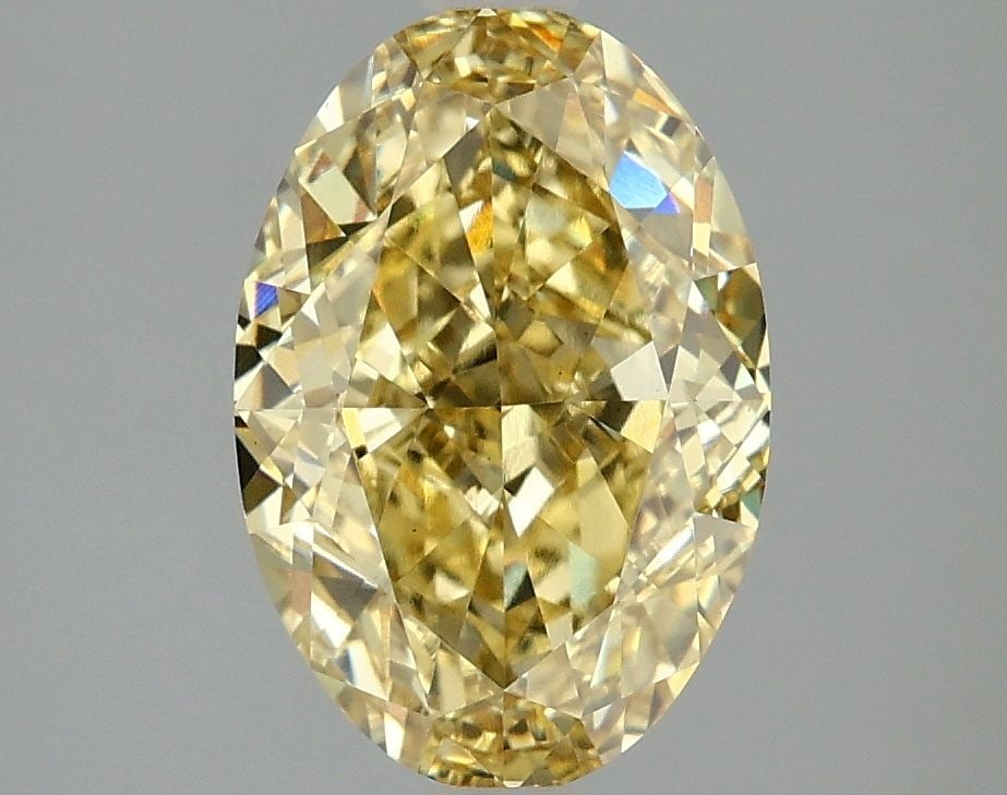 Loose Diamond - OVAL 3.08ct Fancy Intense Yellow VS1: Loose Diamond - OVAL 3.08ct Fancy Intense Yellow VS1 Source: This is a real non-mined Diamond that has been grown in a lab Shape: OVAL Carats: 3.08 Color: Fancy Intense Yellow Certification: IGI Video