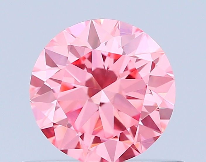 Loose Diamond - ROUND 0.52ct Fancy Vivid Pink VVS1: Loose Diamond - ROUND 0.52ct Fancy Vivid Pink VVS1 Source: This is a real non-mined Diamond that has been grown in a lab Shape: ROUND Carats: 0.52 Color: Fancy Vivid Pink Certification: IGI Video: