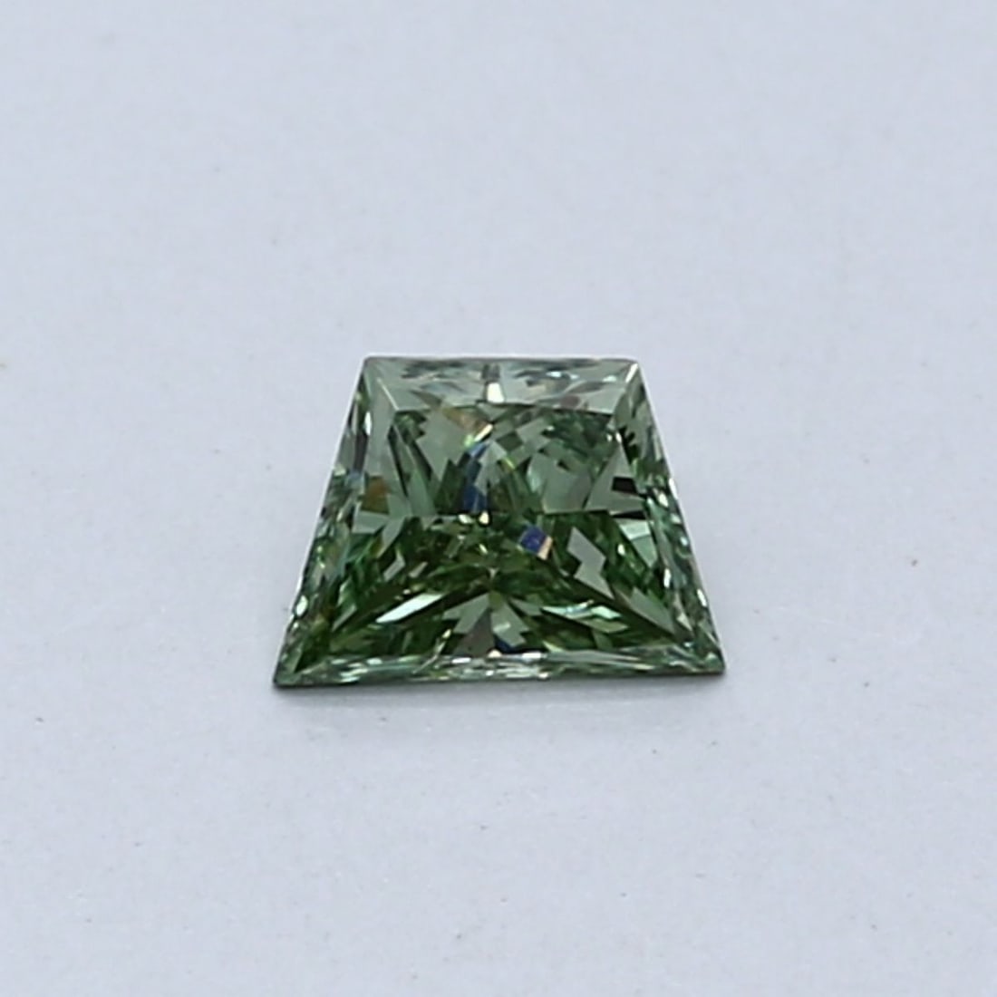 Loose Diamond - TRAPEZOID 0.26ct Fancy Vivid Green VS1: Loose Diamond - TRAPEZOID 0.26ct Fancy Vivid Green VS1 Source: This is a real non-mined Diamond that has been grown in a lab Shape: TRAPEZOID Carats: 0.26 Color: Fancy Vivid Green Certification: NONE