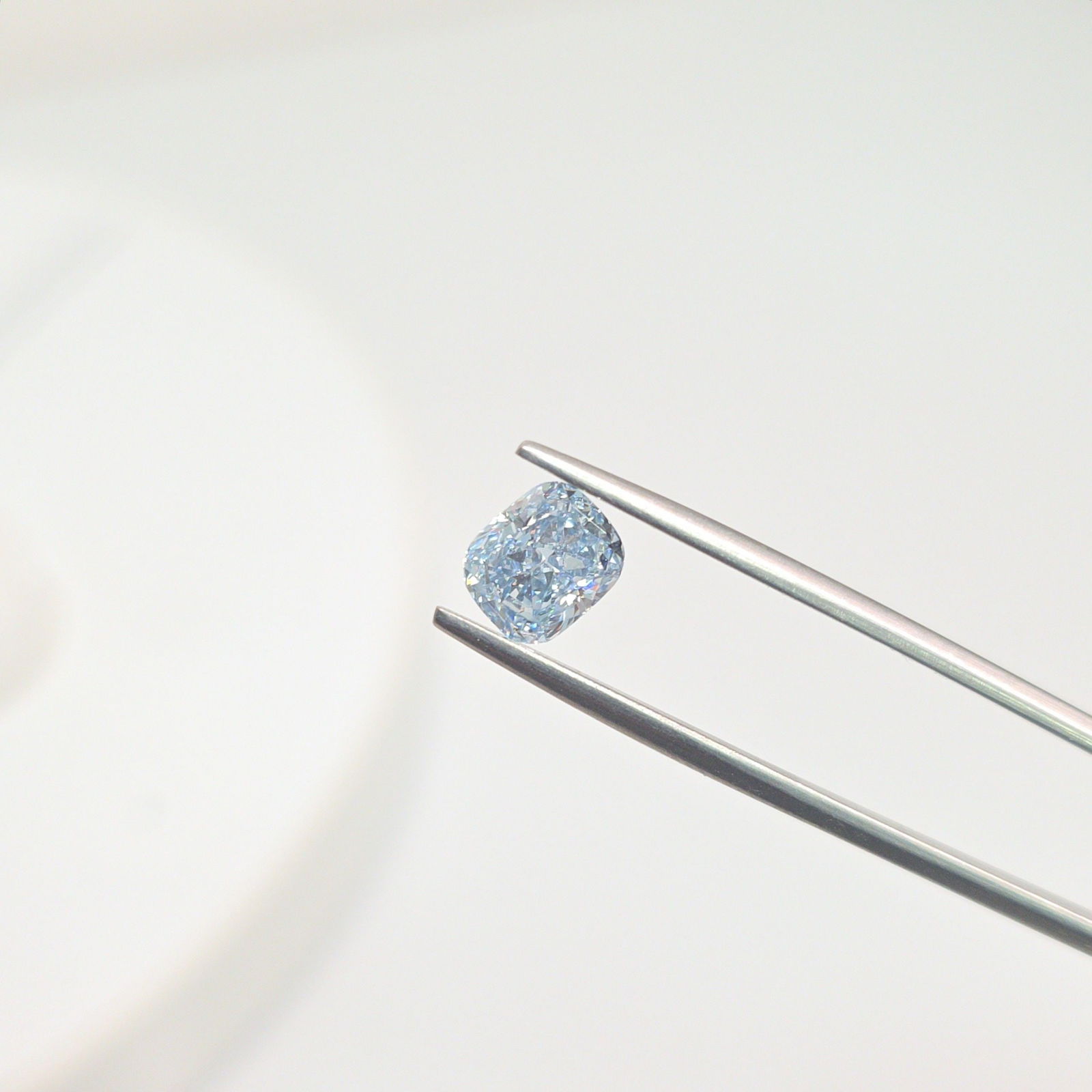 Loose Diamond - CUSHION MODIFIED 1.31ct Fancy Blue VVS2: Loose Diamond - CUSHION MODIFIED 1.31ct Fancy Blue VVS2 Source: This is a real non-mined Diamond that has been grown in a lab Shape: CUSHION MODIFIED Carats: 1.31 Color: Fancy Blue Certification: IGI