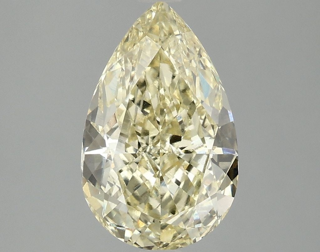 Loose Diamond - PEAR 3.06ct Fancy Vivid Yellow VVS2: Loose Diamond - PEAR 3.06ct Fancy Vivid Yellow VVS2 Source: This is a real non-mined Diamond that has been grown in a lab Shape: PEAR Carats: 3.06 Color: Fancy Vivid Yellow Certification: IGI Video: