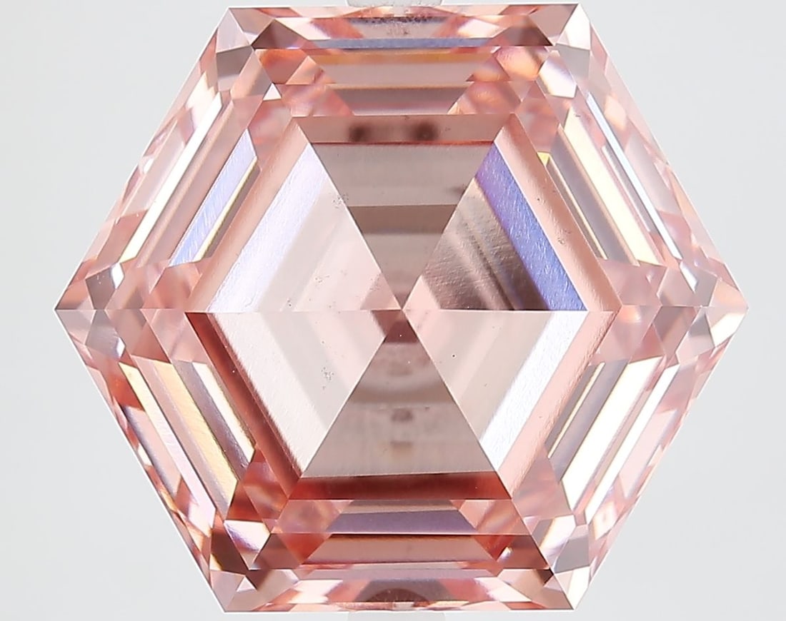 Loose Diamond - HEXAGONAL 12.05ct Fancy Vivid Pink VS1: Loose Diamond - HEXAGONAL 12.05ct Fancy Vivid Pink VS1 Source: This is a real non-mined Diamond that has been grown in a lab Shape: HEXAGONAL Carats: 12.05 Color: Fancy Vivid Pink Certification: IGI V