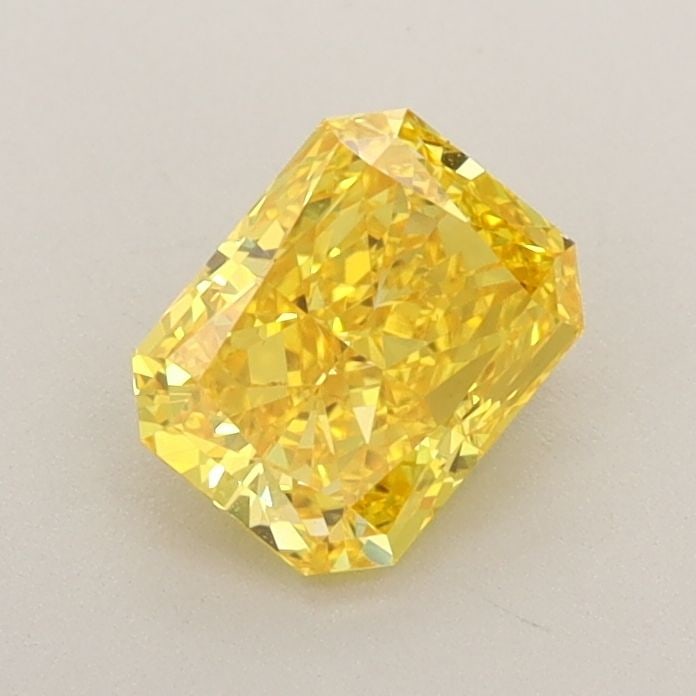 Loose Diamond - RADIANT 0.75ct Fancy Vivid Yellow VS1: Loose Diamond - RADIANT 0.75ct Fancy Vivid Yellow VS1 Source: This is a real non-mined Diamond that has been grown in a lab Shape: RADIANT Carats: 0.75 Color: Fancy Vivid Yellow Certification: IGI Vid