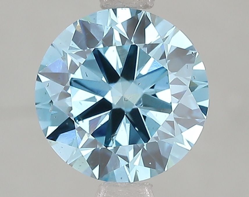 Loose Diamond - ROUND 2.05ct Fancy Vivid Blue VVS2: Loose Diamond - ROUND 2.05ct Fancy Vivid Blue VVS2 Source: This is a real non-mined Diamond that has been grown in a lab Shape: ROUND Carats: 2.05 Color: Fancy Vivid Blue Certification: IGI Video: