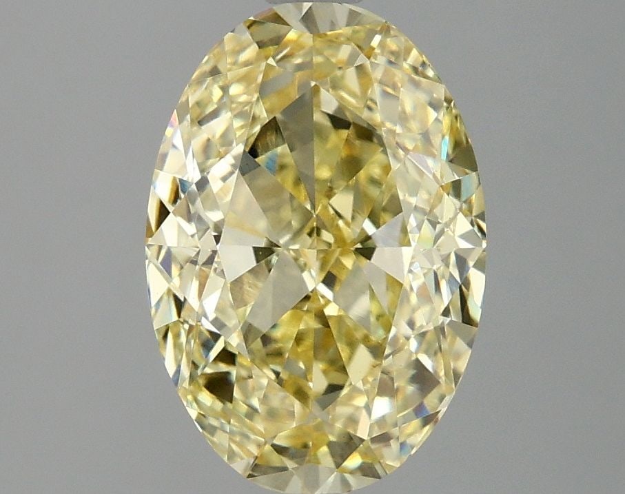Loose Diamond - OVAL 3.02ct Fancy Vivid Yellow VS1: Loose Diamond - OVAL 3.02ct Fancy Vivid Yellow VS1 Source: This is a real non-mined Diamond that has been grown in a lab Shape: OVAL Carats: 3.02 Color: Fancy Vivid Yellow Certification: IGI Video: