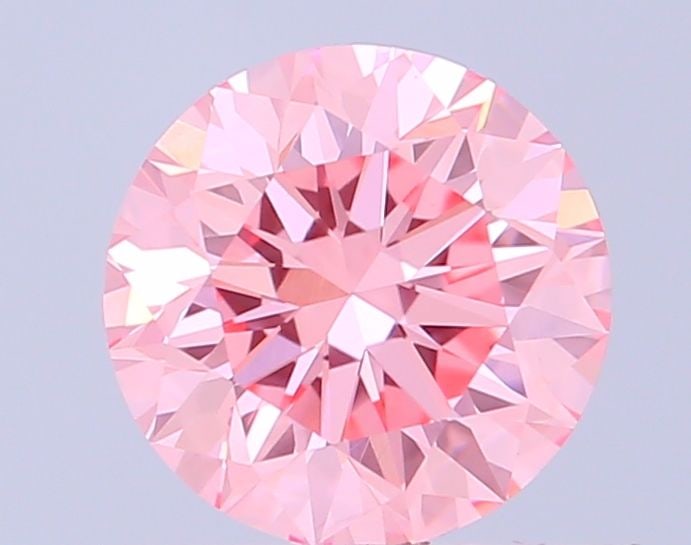 Loose Diamond - ROUND 0.67ct Fancy Vivid Pink VS1: Loose Diamond - ROUND 0.67ct Fancy Vivid Pink VS1 Source: This is a real non-mined Diamond that has been grown in a lab Shape: ROUND Carats: 0.67 Color: Fancy Vivid Pink Certification: IGI Video: