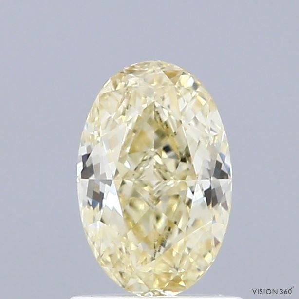 Loose Diamond - OVAL 0.91ct Fancy Light Yellow VS1: Loose Diamond - OVAL 0.91ct Fancy Light Yellow VS1 Source: This is a real non-mined Diamond that has been grown in a lab Shape: OVAL Carats: 0.91 Color: Fancy Light Yellow Certification: IGI Video: