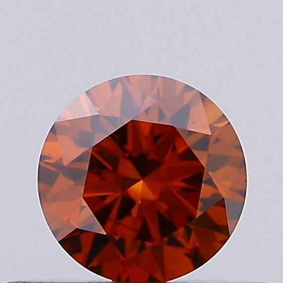 Ideal Loose Diamond - ROUND 0.27ct Fancy Vivid Brownish Orange VS1: Ideal Loose Diamond - ROUND 0.27ct Fancy Vivid Brownish Orange VS1 Source: This is a real non-mined Diamond that has been grown in a lab Shape: ROUND Carats: 0.27 Color: Fancy Vivid Brownish Orange Ce