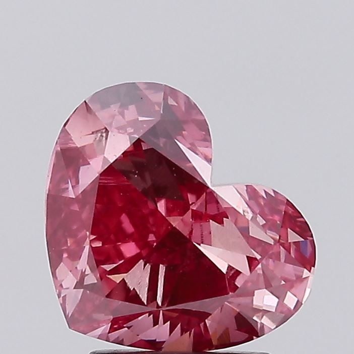 Loose Diamond - HEART 3.12ct Fancy Vivid Pink VS1: Loose Diamond - HEART 3.12ct Fancy Vivid Pink VS1 Source: This is a real non-mined Diamond that has been grown in a lab Shape: HEART Carats: 3.12 Color: Fancy Vivid Pink Certification: IGI Video:
