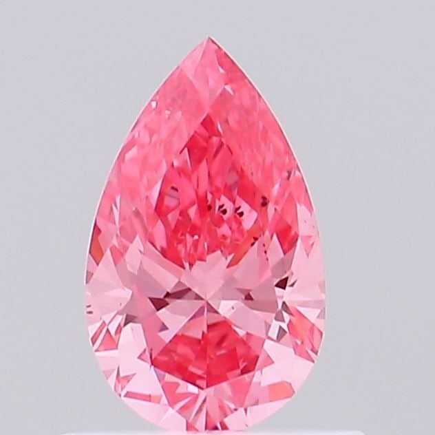 Loose Diamond - PEAR 0.52ct Fancy Vivid Pink VS2: Loose Diamond - PEAR 0.52ct Fancy Vivid Pink VS2 Source: This is a real non-mined Diamond that has been grown in a lab Shape: PEAR Carats: 0.52 Color: Fancy Vivid Pink Certification: IGI Video: