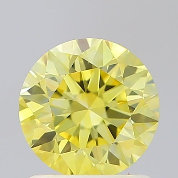 Loose Diamond - ROUND 1.01ct Fancy Vivid Yellow VVS2: Loose Diamond - ROUND 1.01ct Fancy Vivid Yellow VVS2 Source: This is a real non-mined Diamond that has been grown in a lab Shape: ROUND Carats: 1.01 Color: Fancy Vivid Yellow Certification: IGI Video: