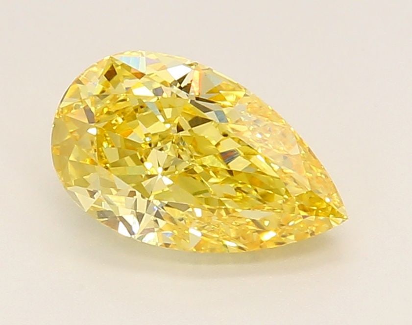 Loose Diamond - PEAR 1.74ct Fancy Vivid Yellow VS1: Loose Diamond - PEAR 1.74ct Fancy Vivid Yellow VS1 Source: This is a real non-mined Diamond that has been grown in a lab Shape: PEAR Carats: 1.74 Color: Fancy Vivid Yellow Certification: IGI Video: