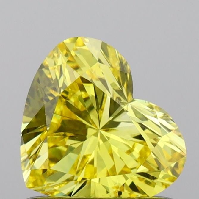 Loose Diamond - HEART 0.73ct Fancy Vivid Yellow VS1: Loose Diamond - HEART 0.73ct Fancy Vivid Yellow VS1 Source: This is a real non-mined Diamond that has been grown in a lab Shape: HEART Carats: 0.73 Color: Fancy Vivid Yellow Certification: IGI Video: