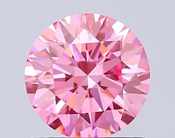 Ideal Loose Diamond - ROUND 1.0ct Fancy Vivid Pink VS1: Ideal Loose Diamond - ROUND 1.0ct Fancy Vivid Pink VS1 Source: This is a real non-mined Diamond that has been grown in a lab Shape: ROUND Carats: 1.0 Color: Fancy Vivid Pink Certification: IGI Video: