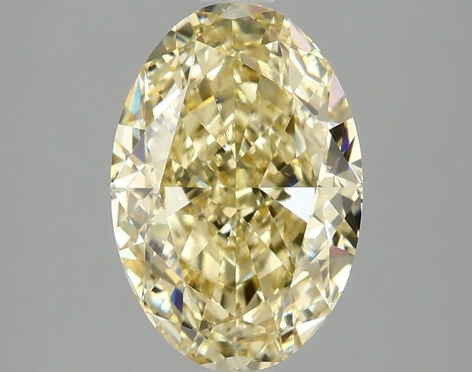 Loose Diamond - OVAL 3.05ct Fancy Intense Yellow VS2: Loose Diamond - OVAL 3.05ct Fancy Intense Yellow VS2 Source: This is a real non-mined Diamond that has been grown in a lab Shape: OVAL Carats: 3.05 Color: Fancy Intense Yellow Certification: IGI Video