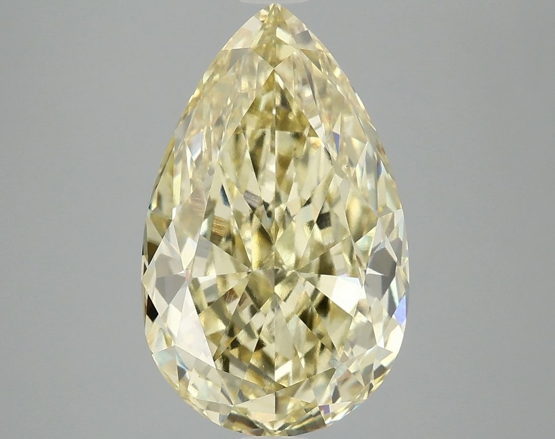 Loose Diamond - PEAR 5.06ct Fancy Yellow VS1: Loose Diamond - PEAR 5.06ct Fancy Yellow VS1 Source: This is a real non-mined Diamond that has been grown in a lab Shape: PEAR Carats: 5.06 Color: Fancy Yellow Certification: IGI Video: