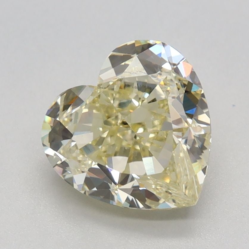 Loose Diamond - HEART 1.62ct Fancy Light Yellow VS1: Loose Diamond - HEART 1.62ct Fancy Light Yellow VS1 Source: This is a real non-mined Diamond that has been grown in a lab Shape: HEART Carats: 1.62 Color: Fancy Light Yellow Certification: IGI Video: