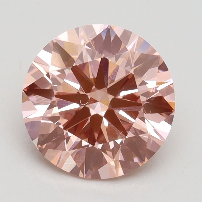 Ideal Loose Diamond - ROUND 2.02ct Fancy Vivid Pink VS1: Ideal Loose Diamond - ROUND 2.02ct Fancy Vivid Pink VS1 Source: This is a real non-mined Diamond that has been grown in a lab Shape: ROUND Carats: 2.02 Color: Fancy Vivid Pink Certification: IGI Video