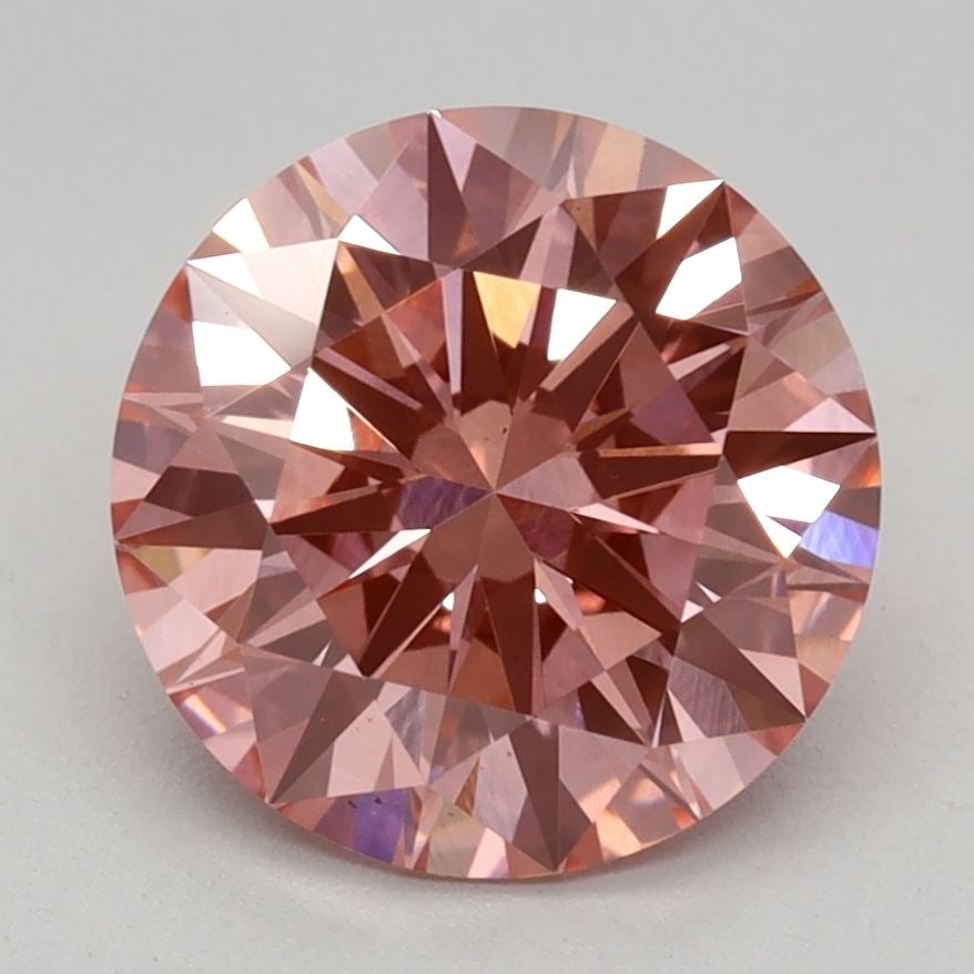Ideal Loose Diamond - ROUND 2.03ct Fancy Vivid Pink VS1: Ideal Loose Diamond - ROUND 2.03ct Fancy Vivid Pink VS1 Source: This is a real non-mined Diamond that has been grown in a lab Shape: ROUND Carats: 2.03 Color: Fancy Vivid Pink Certification: IGI Video