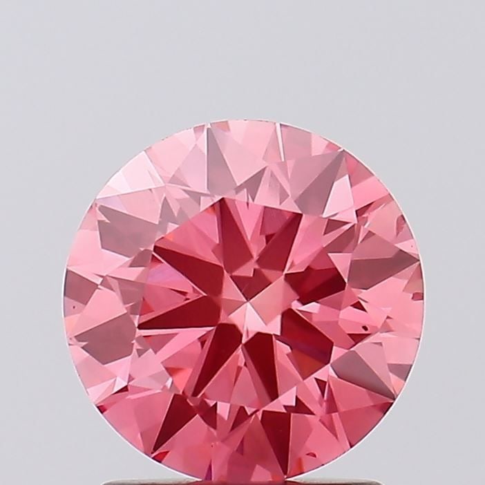 Ideal Loose Diamond - ROUND 1.51ct Fancy Vivid Pink VS2: Ideal Loose Diamond - ROUND 1.51ct Fancy Vivid Pink VS2 Source: This is a real non-mined Diamond that has been grown in a lab Shape: ROUND Carats: 1.51 Color: Fancy Vivid Pink Certification: IGI Video