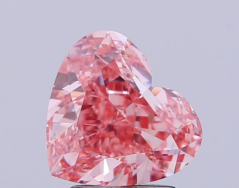 Loose Diamond - HEART 3.02ct Fancy Vivid Pink VS1: Loose Diamond - HEART 3.02ct Fancy Vivid Pink VS1 Source: This is a real non-mined Diamond that has been grown in a lab Shape: HEART Carats: 3.02 Color: Fancy Vivid Pink Certification: IGI Video: