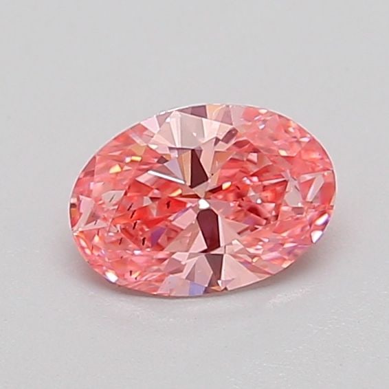 Loose Diamond - OVAL 0.52ct Fancy Vivid Pink SI2: Loose Diamond - OVAL 0.52ct Fancy Vivid Pink SI2 Source: This is a real non-mined Diamond that has been grown in a lab Shape: OVAL Carats: 0.52 Color: Fancy Vivid Pink Certification: IGI Video: