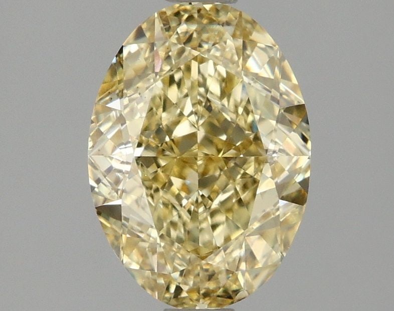 Loose Diamond - OVAL 2.1ct Fancy Intense Yellow VS2: Loose Diamond - OVAL 2.1ct Fancy Intense Yellow VS2 Source: This is a real non-mined Diamond that has been grown in a lab Shape: OVAL Carats: 2.1 Color: Fancy Intense Yellow Certification: IGI Video:
