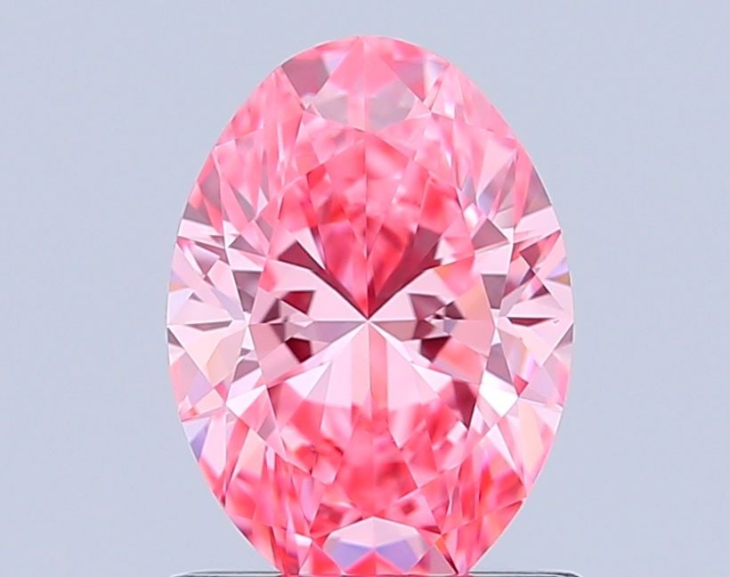 Loose Diamond - OVAL 1.01ct Fancy Vivid Pink VVS2: Loose Diamond - OVAL 1.01ct Fancy Vivid Pink VVS2 Source: This is a real non-mined Diamond that has been grown in a lab Shape: OVAL Carats: 1.01 Color: Fancy Vivid Pink Certification: IGI Video: