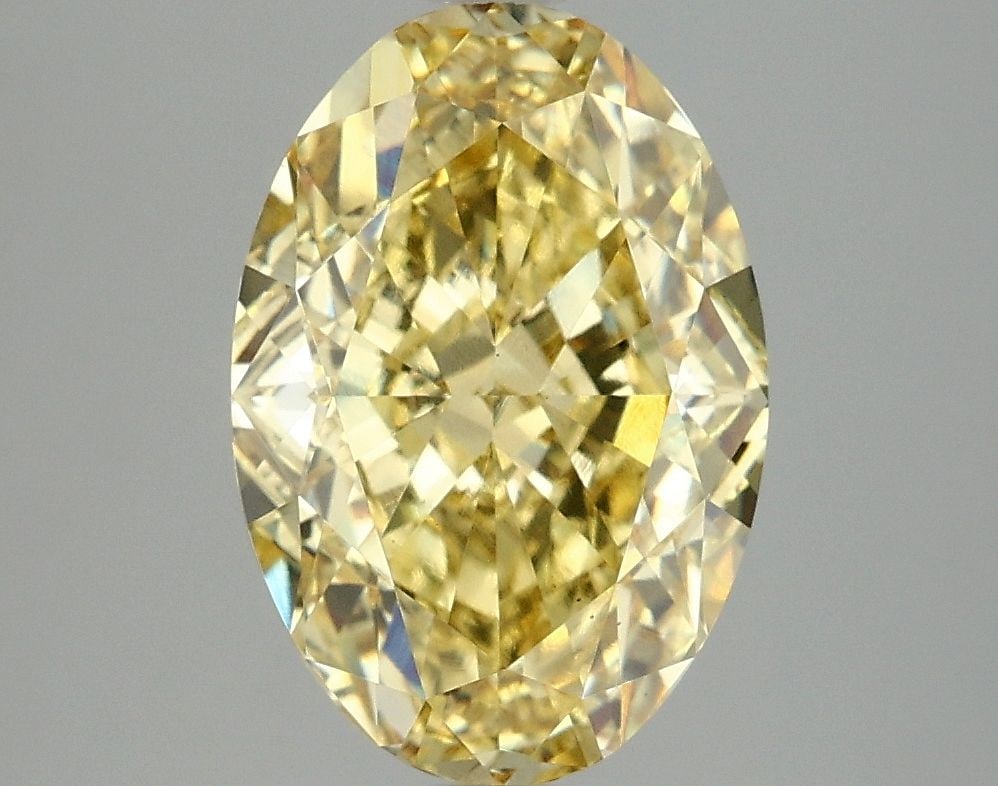 Loose Diamond - OVAL 4.09ct Fancy Vivid Yellow VS1: Loose Diamond - OVAL 4.09ct Fancy Vivid Yellow VS1 Source: This is a real non-mined Diamond that has been grown in a lab Shape: OVAL Carats: 4.09 Color: Fancy Vivid Yellow Certification: IGI Video: