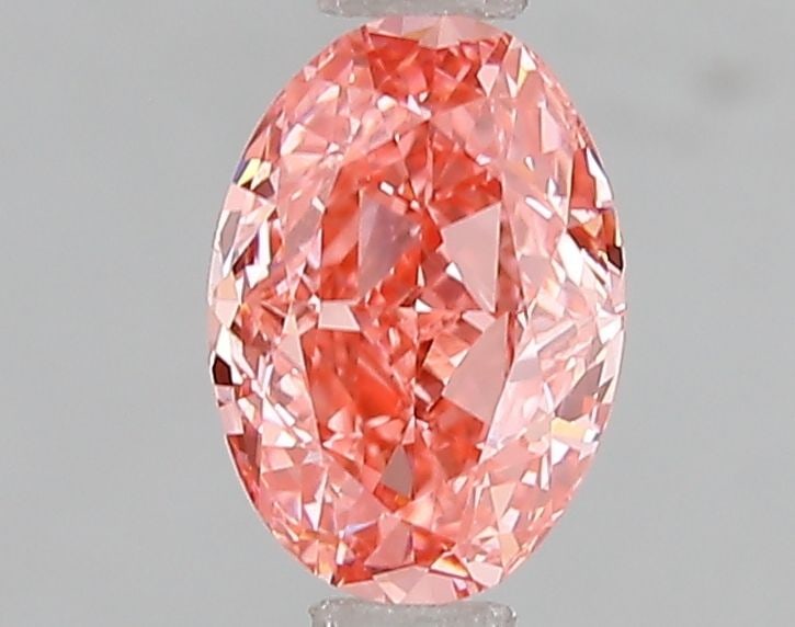 Loose Diamond - OVAL 1.03ct Fancy Vivid Pink VS1: Loose Diamond - OVAL 1.03ct Fancy Vivid Pink VS1 Source: This is a real non-mined Diamond that has been grown in a lab Shape: OVAL Carats: 1.03 Color: Fancy Vivid Pink Certification: IGI Video: