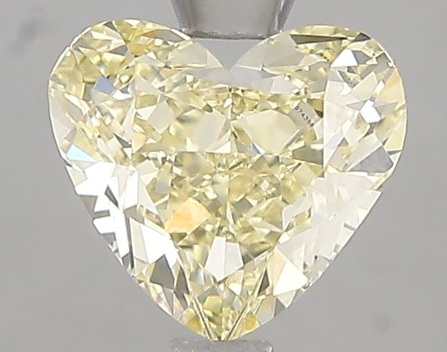 Loose Diamond - HEART 1.53ct Fancy Yellow VVS2: Loose Diamond - HEART 1.53ct Fancy Yellow VVS2 Source: This is a real non-mined Diamond that has been grown in a lab Shape: HEART Carats: 1.53 Color: Fancy Yellow Certification: IGI Video: