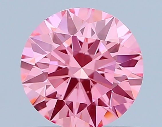 Ideal Loose Diamond - ROUND 0.8ct Fancy Vivid Pink VS1: Ideal Loose Diamond - ROUND 0.8ct Fancy Vivid Pink VS1 Source: This is a real non-mined Diamond that has been grown in a lab Shape: ROUND Carats: 0.8 Color: Fancy Vivid Pink Certification: IGI Video:
