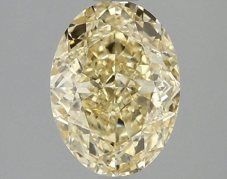 Loose Diamond - OVAL 2.1ct Fancy Intense Yellow VS1: Loose Diamond - OVAL 2.1ct Fancy Intense Yellow VS1 Source: This is a real non-mined Diamond that has been grown in a lab Shape: OVAL Carats: 2.1 Color: Fancy Intense Yellow Certification: IGI Video: