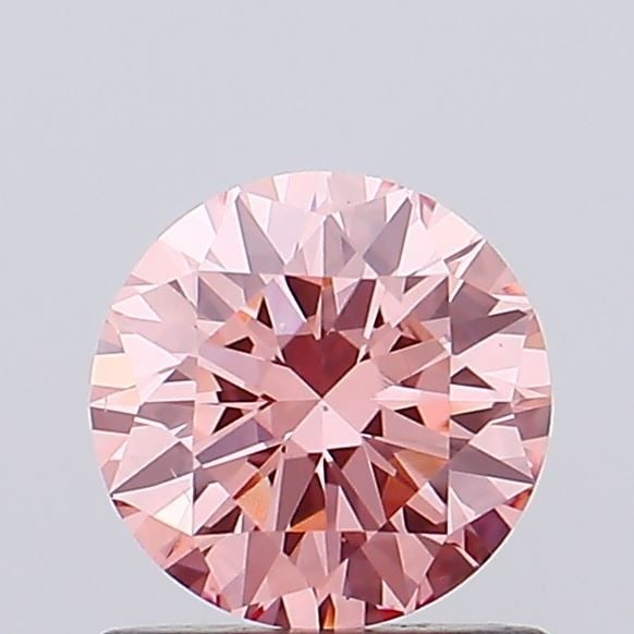Loose Diamond - ROUND 0.69ct Fancy Vivid Pink VS2: Loose Diamond - ROUND 0.69ct Fancy Vivid Pink VS2 Source: This is a real non-mined Diamond that has been grown in a lab Shape: ROUND Carats: 0.69 Color: Fancy Vivid Pink Certification: IGI Video:
