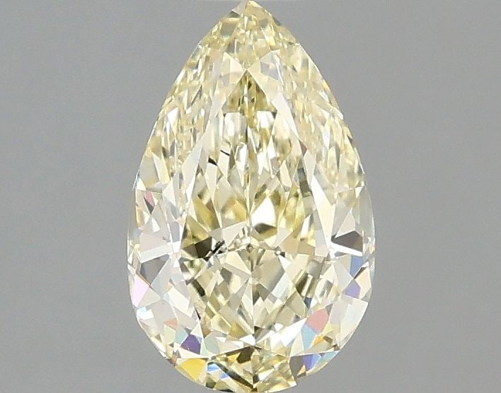 Loose Diamond - PEAR 1.07ct Fancy Yellow VVS2: Loose Diamond - PEAR 1.07ct Fancy Yellow VVS2 Source: This is a real non-mined Diamond that has been grown in a lab Shape: PEAR Carats: 1.07 Color: Fancy Yellow Certification: IGI Video: